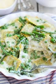 Baked Ravioli With Asparagus And Peas Celebrating Sweets Vegetarian Recipes Easy Vegetarian Recipes Ravioli Bake
