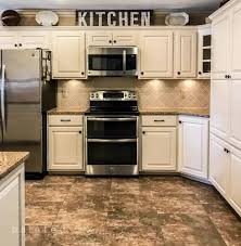 Choosing the right paint color can bring a tired room back to life, and can make an outdated kitchen with honey oak cabinets look updated. Bye Bye Honey Oak Kitchen Cabinets Hello Brighter Kitchen
