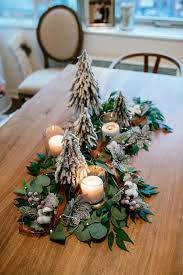 Easy way to make your own magnolia garland using fake flowers. Diy Holiday Greenery Table Runner Katie S Bliss
