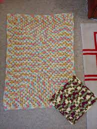 How many balls of yarn are you using, and how big do you think the finished product will be? Lap Blanket Commissioned By My Mum Bernat Blanket Yarn In Sailors Delight Bonus Puppy Blanket With Leftover Yarn In Plum Fields Crochet