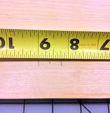 The metric/metric reverse features metric measurements that are readable when the tape is these tapes measure in 16th increments with the graduation marks to the top and the inch marks to the bottom. Diy Basics How To Quickly Determine The Midpoint Fraction Free Core77