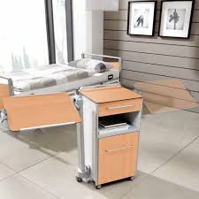A large bed requires larger nightstands, and vice versa. Bedside Table On Casters Somero Stiegelmeyer Gmbh Co Kg With Drawers With Integrated Over Bed Table