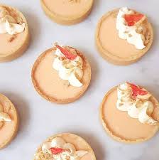 Grapefruit Curd Tarts With Creme Diplomat Like Custard With Whipped Cream Folded Through It And Turmeric Crumble Eve Rhubarb And Custard Bakery London Cake