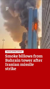 Iranian missile strikes high-rise tower in Bahrain⁠, ⁠, Footage captures  the moment an Iranian missile hit a tower in a central area of Bahrain. The  strike on the high-rise marks a significant ...