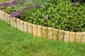 Le alte fioriture di salvia blu forniranno copertura per il divario quando i papaveri si sono sbiaditi. Edging Awbs Landscaping And Building Supplies Garden Edging Wood Landscape Edging Small Backyard Gardens