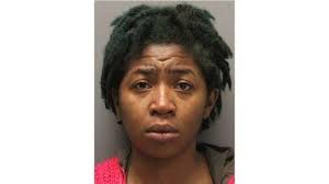 A 23-year-old woman, Deborah Benefiel, has been charged with murder and  criminal recklessness after she followed a driver who had honked at her,  then yelled and made gestures at him before pulling