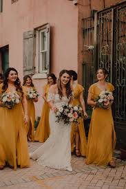 Mustard Yellow Bridesmaids The Alanna Dress Features Flutter Sleeves That Create A Romantic In 2020 Bridesmaid Dresses Boho Summer Wedding Dress Yellow Bridesmaids