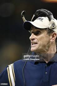 Place kicker Jeff Wilkins of the St. Louis Rams and holder Dane... News  Photo