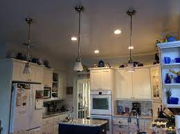 Insert markers to indicate the placement of items such as workspaces, counters, shelves and furniture, along with any wall hangings or other artwork. Replace Pendants With Recessed Lighting