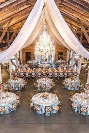 100 Rustic Wedding Ideas For 2019 Country Barn Wedding With White Drapery Hanging Decor Country Barn Weddings Barn Wedding Decorations Barn Wedding Reception