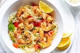 Many scampi recipes involve cooking the shrimp with the other ingredients. Shrimp Scampi With Asparagus And Tomatoes Saving Room For Dessert