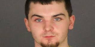 Yale man charged with firing shotgun at another man's home