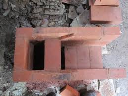 a wood burning masonry cookstove