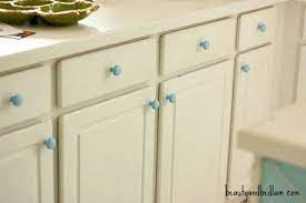 Remove fronts and hardware.paint cabinets video. Spray Painting Cabinet Knobs Good Enough Things Jen Schmidt