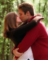 Romantic Happy Kiss Day Shayari Avanvu Adorable young female model makes air kiss.