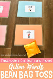 Learn And Move With A Bean Bag Toss Game For Preschoolers Bean Bag Activities Preschool Games Bean Bag Toss Game