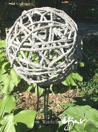 How to make concrete garden spheres. Concrete Garden Orbs Made By Barb Simple Diy Portland Cement Dipped Yarn Or Fabric Formed Over Inflated Balls Or Balloons