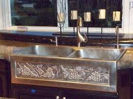 The double sink is also handy for having a separate receptacle for a waste disposal unit (although you can install a waste. Elite Bath Kitchen Sinks Farmhouse Bronze Chameleon Dbfs36 36 Double Farmhouse Kitchen Sink Includes Art Panel Wave Plumbing Supply