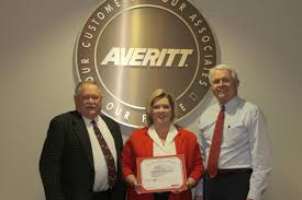 Averitt honors director of international solutions for 20 years of service 