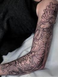 Colorful peacock tattoo on left half sleeve. 30 Best Peacock Tattoo Design Ideas What Is Your Favorite Saved Tattoo