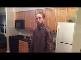 The photo shows pattinson wearing a brown track. Tracksuit Robert Pattinson Standing In The Kitchen Video Gallery Sorted By Score Know Your Meme