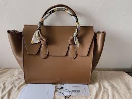 Learn how to tie 11 basic and advanced knots fast with these animated illustrations. Celine Tie Knot Camel Luxury Bags Wallets Handbags On Carousell