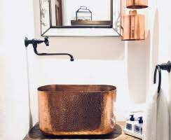 Women's clothing, accessories and lookbooks with their own identity. Copper Bathroom Sink Lola Amoretti Brothers Archello