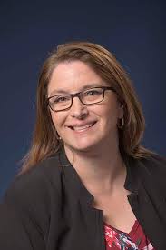 Trine promotes Floto to executive director