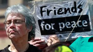 Community members gather during a peace rally for Gaza