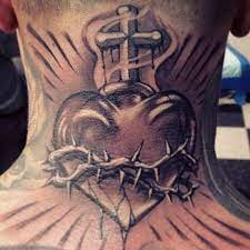 Heart Tattoos For Men Best Designs And Ideas Of 2019 Sacred Heart Tattoos Heart Tattoo Broken Heart Tattoo