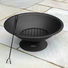A fire bowl is similar to a fire pit, but it often comes preassembled and sits off the ground on a pedestal. Harrier Steel Outdoor Fire Pit Net World Sports