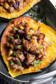 This Roasted Stuffed Acorn Squash Is Filled With All Your Favorites Sausage Apples Cranberries Onions Celery A Recipes Acorn Squash Recipes Paleo Recipes