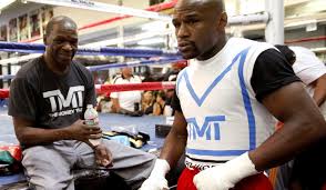The Mayweathers Are In This Fight Together Los Angeles Times