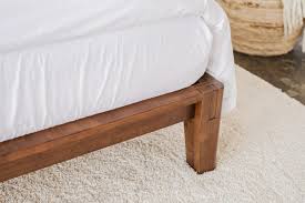 Each bed is made from repurposed wood, so natural imperfections, unique wood grains, and knots make each piece unique. How Thuma Designed The Perfect Platform Bed
