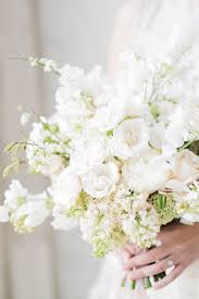 Anemones , also called windflowers, are in season from january through april, but brides willing to pay extra can buy imported anemones in the second half of the year. Fine Art Pink White Bridal Bouquet Simple Wedding Bouquets Classic Wedding Bouquet Flower Bouquet Wedding