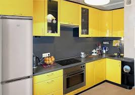 Vintage inspired warehouse lighting adds to the overall midcentury vibe. Small Kitchen Remodeling Ideas Accentuated With Sunny Yellow Color Kitchen Remodel Small Yellow Kitchen Designs Kitchen Design Small