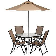 Flash furniture nantucket 6 piece black patio garden set with table, umbrella and 4 folding chairs. 6 Piece Outdoor Folding Patio Set With Table 4 Chairs Umbrella And Built In Base Amazon In Furniture