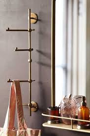 The questions below will also help you separate out the hangers coat rack options you're aiming for. Light Gold Vertical Coat Rack With Swivelling Pegs Rockett St George Vertical Coat Rack Modern Coat Rack Coat Rack