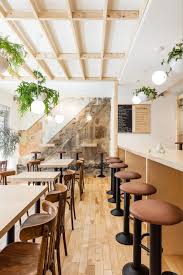 Japanese Restaurant Combines Minimal Details And Unfinished Surfaces Japanese Restaurant Design Japanese Restaurant Interior Bistro Design