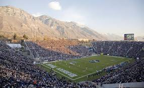 football stadium at byu with the wasatch mountains in the