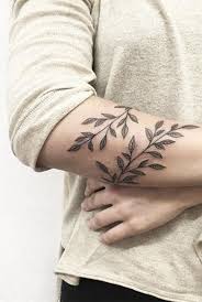 Vines wrapped around arm tattoo. 30 Delicate Flower Tattoo Ideas Vine Arm Tattoo Delicate Flower Tattoo Vine Tattoos