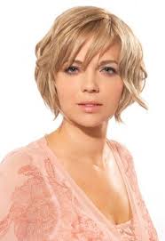 If a bob is your choice of style, go a few inches longer than a traditional bob to balance the roundness of the face. Layered Bob Hairstyles For 2014 Popular Haircuts Short Hair Styles For Round Faces Thick Hair Styles Round Face Haircuts