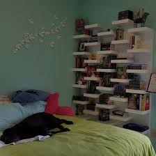 They are placed next to our desk so they can walk from it and jump to each shelf until they are over seven feet high to look down on us. Ikea Lack Wall Shelf Unit Great For Small Rooms Open Concept Pictured Are 5 Verticle Book Shelves Remodel Bedroom Kids Bedroom Remodel Guest Bedroom Remodel