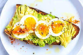 Smashed Avocado Toast With Egg Recipe Healthy Breakfast Avocado Toast Egg Healthy Snacks
