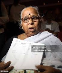 Usha Naik, mother of Ramesh Naik who won the flat in Handicap... News Photo 