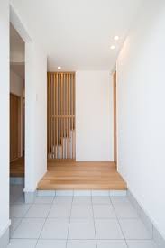 ue bo design ウエボデザイン 注文住宅 施工事例 玄関 エントランス 階段 格子 木 愛知県 安城市 玄関 格子 家 住宅