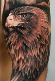 This bald eagle has its wings spread, and in this position, the tattoo appears to be completely symmetrical. Pin By Tom Holman On Tattoos Eagle Tattoos Eagle Tattoo Eagle Head Tattoo