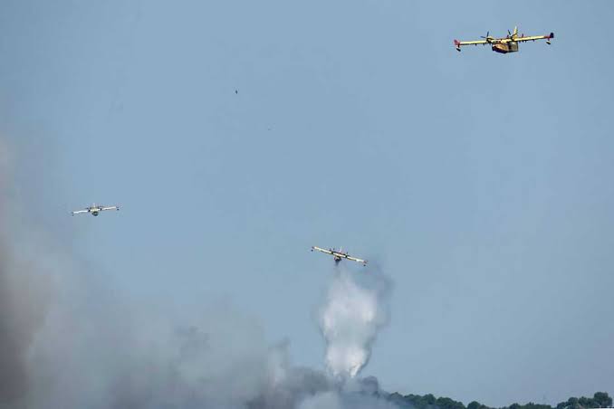 France battles ongoing wildfires as over 250,000 evacuated; Spain sees progress with major fires under control