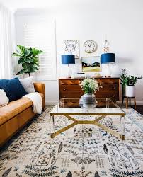 It features open shelving, as well as two hidden compartments that are perfect for stashing dvds, board games, electronics, and media accessories. Modern Credenza Anita Yokota Vintage Modern Living Room Mid Century Modern Living Room Vintage Living Room
