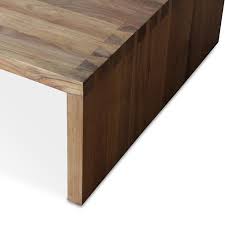 The smaller table turns into and underneath the larger table on a woodblock swivel. Indoor Outdoor Dovetail Coffee Table Hollywood At Home